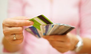 woman choose one credit card, concept of  credit  debt